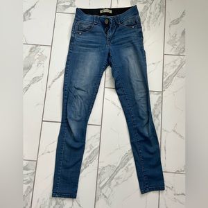 Democracy jeans, medium wash, size 4.  Stretchy material. Great condition